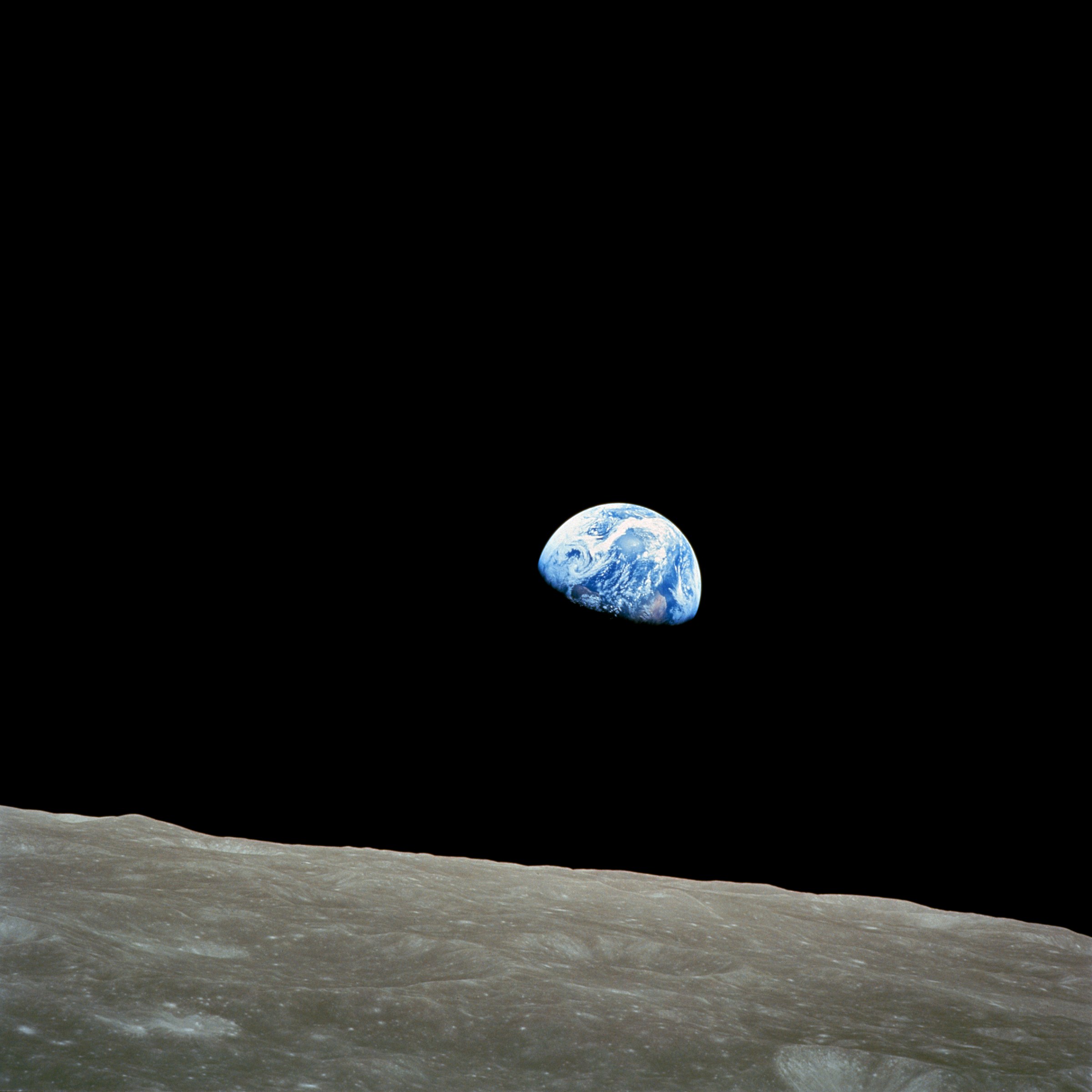 nasa-apollo8-dec24-earthrise Taken by Apollo 8 crewmember Bill Anders on December 24, 1968, showing the Earth seemingly rising above the lunar surface. Note that this phenomenon is only visible from someone in orbit around the Moon. Because of the Moon's synchronous rotation about the Earth (i.e., the same side of the Moon is always facing the Earth), no Earthrise can be observed by a stationary observer on the surface of the Moon.
