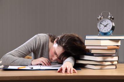 College student sleeping instead of studying