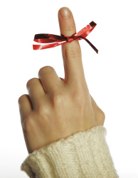 Ribbon tied around a finger as a reminder