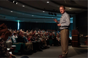 Dr. Raison engages the audience at the Forum.