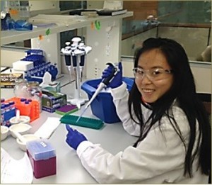 Yang Chen, 2015 graduate, at her worksite in the lab of Dr. Xuehua Zhong, UW-Madison Department of Genetics; mentor: Dean Sanders. Yang is currently a freshman at UW-Madison, majoring in microbiology.