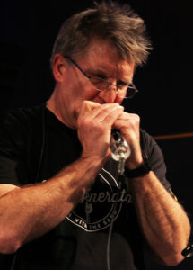 Todd Swanson jams on the harmonica with Lead Generation.