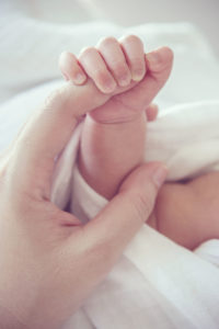 41731849 - soft focus and blurry of baby hands vintage style color effect
