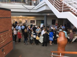 Attendees at 2016 forum during break.