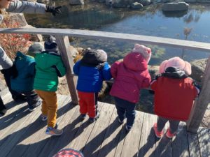 Children from Woods Hollow Children's Center explore the Promega Madison campus.