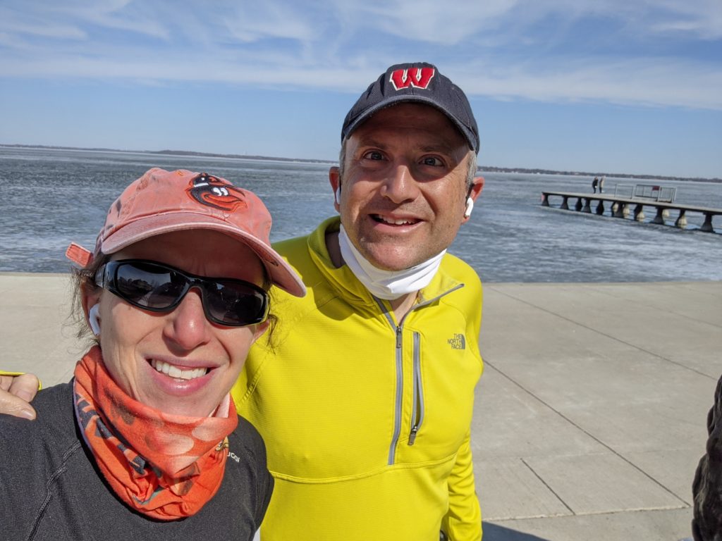 Virologists David and Shelby O'Connor (shown running along Lake Mendota) have worked extensively in SARS-CoV-2 Sequencing and COVID-19 Testing