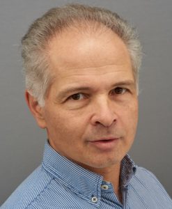 headshot of Dr. Urs Albrecht