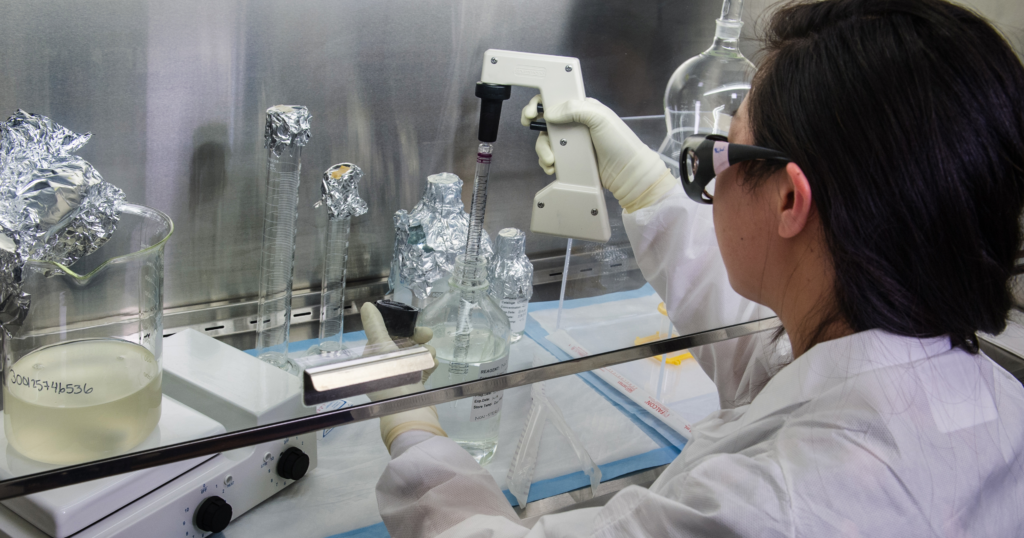 A CDC Scientist concentrating poliovirus from sewage to grow the virus in cultured cells prior to testing using PCR and sequencing. Photo credit: James Gathany, CDC