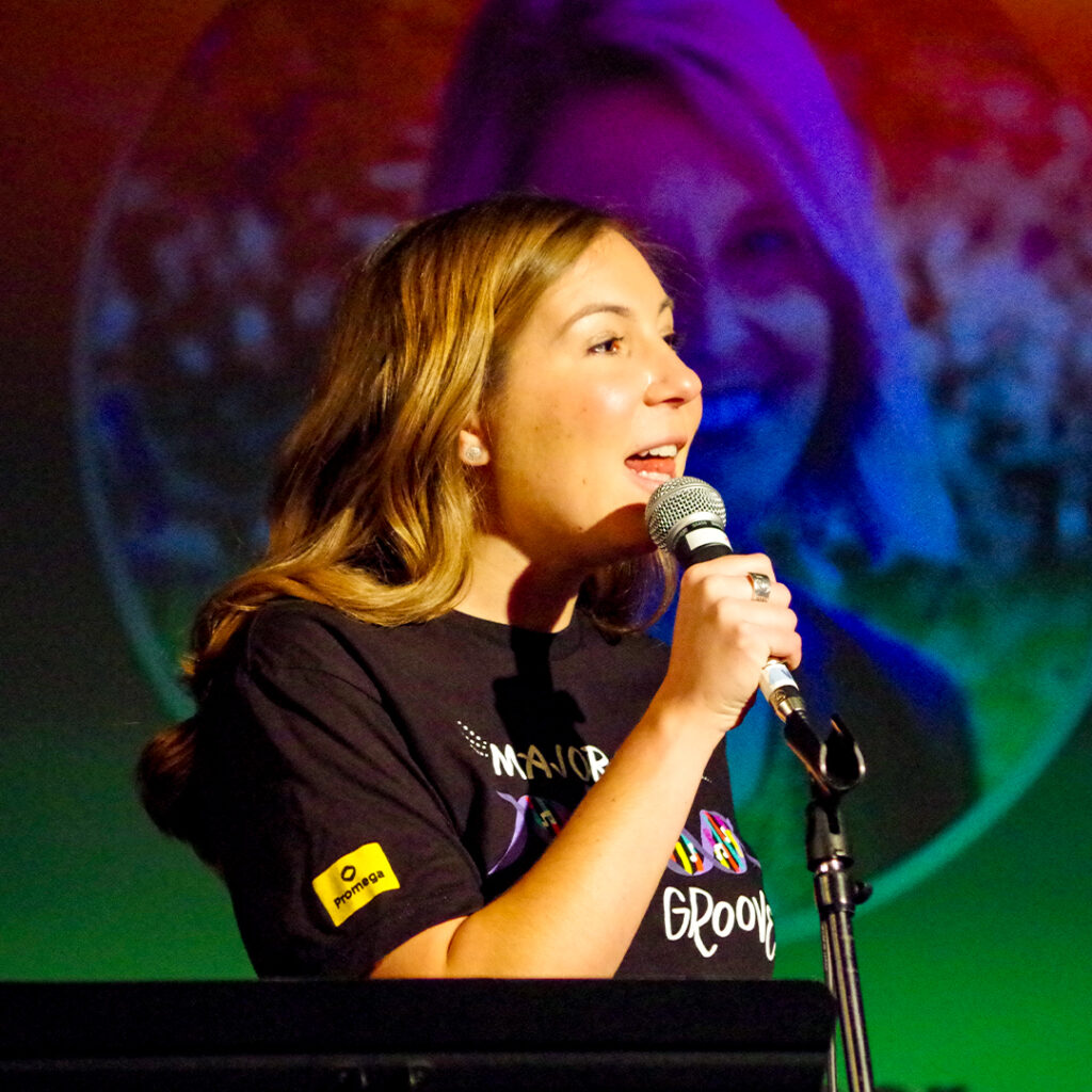 Kathryn Sauter sings with Major Groove, the Promega employee band